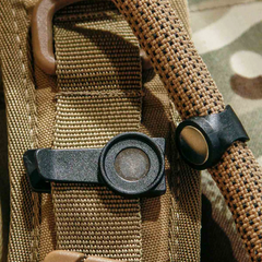 Source magnetic hose holder